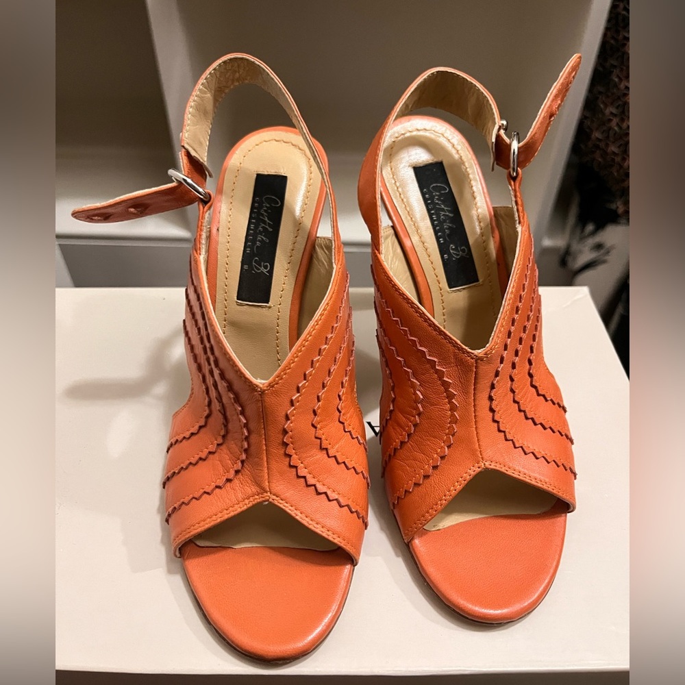Gorgeous orange leather hills with open back and front. Perfect condition.
